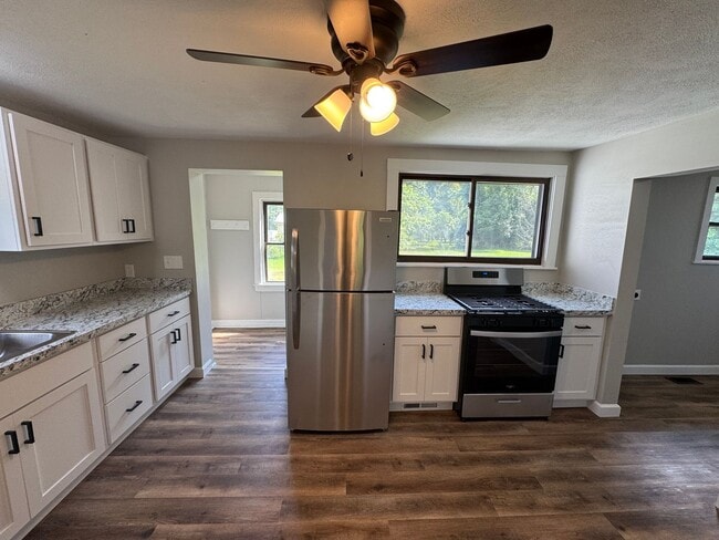 Building Photo - Complete Remodel - Beautiful 4 Bedroom Hou...