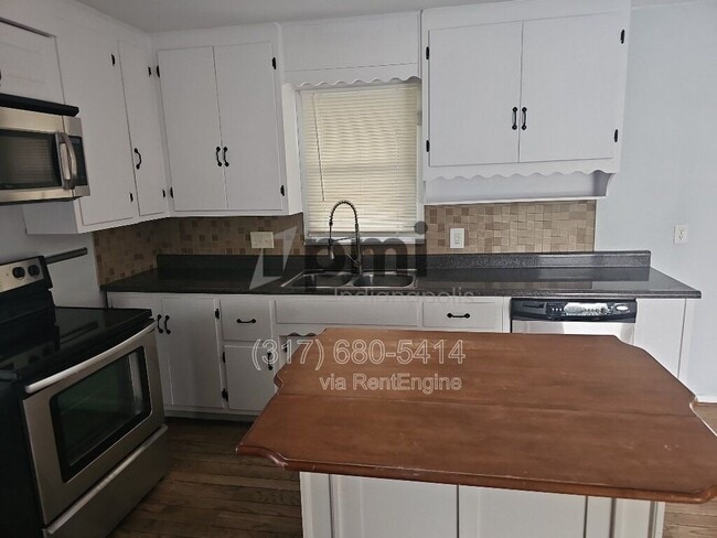 Building Photo - 7056 Caroline Ave