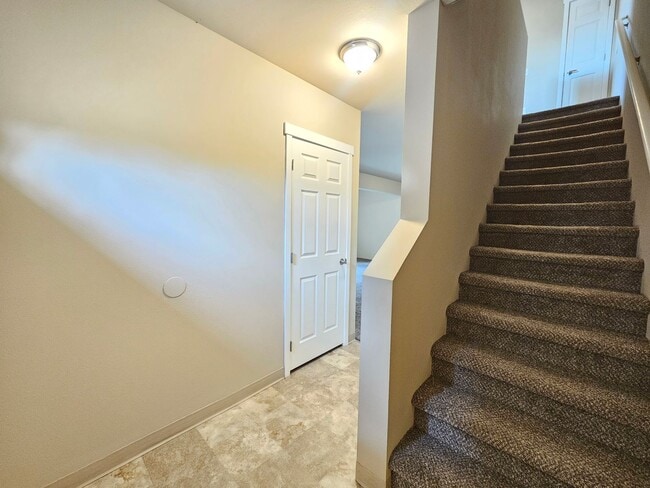 Building Photo - 5207-5207 E Upriver Dr