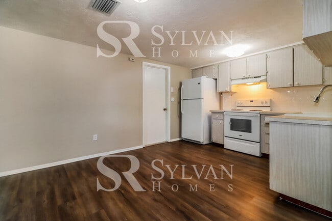 Building Photo - Charming 4BR 2BA Home