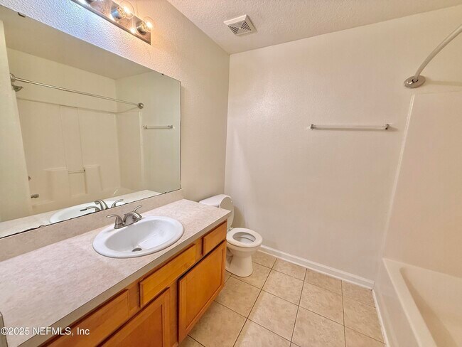 Building Photo - 6788 Manotak Oaks Dr