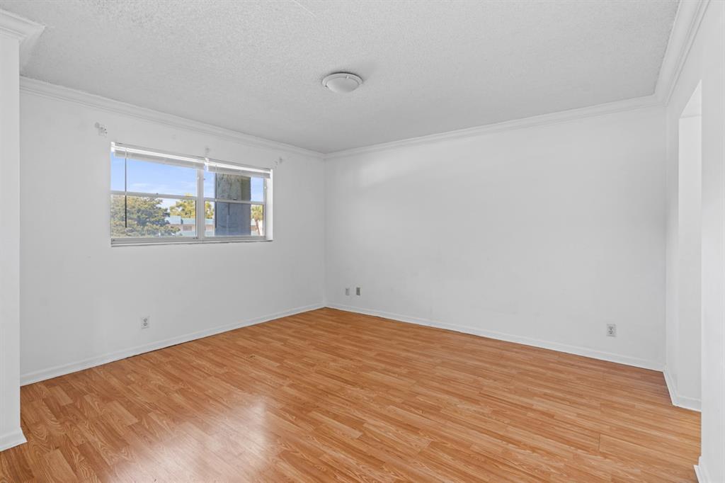 Building Photo - 6075 N Sabal Palm Blvd