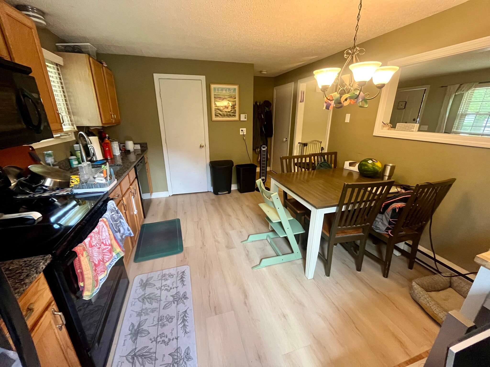 Kitchen with updated flooring - 98 Hayward St