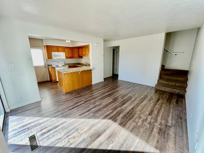 Building Photo - Updated 3-BR Tri-Level Townhome with Walk-...