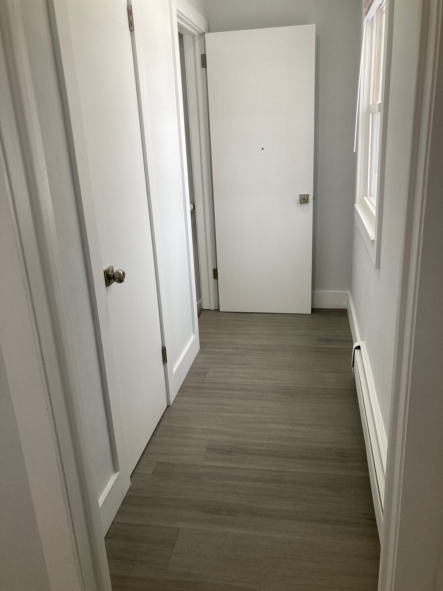 Back hallway leading to steps. There are also steps from the front of the house. - 1430 4th St N