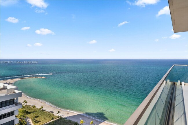 Building Photo - 10203 Collins Ave