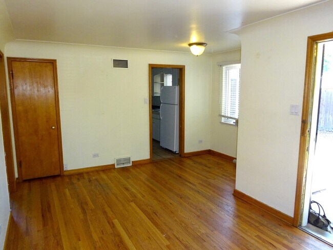 Building Photo - Two Bedroom Apartment With Hardwood Floors...