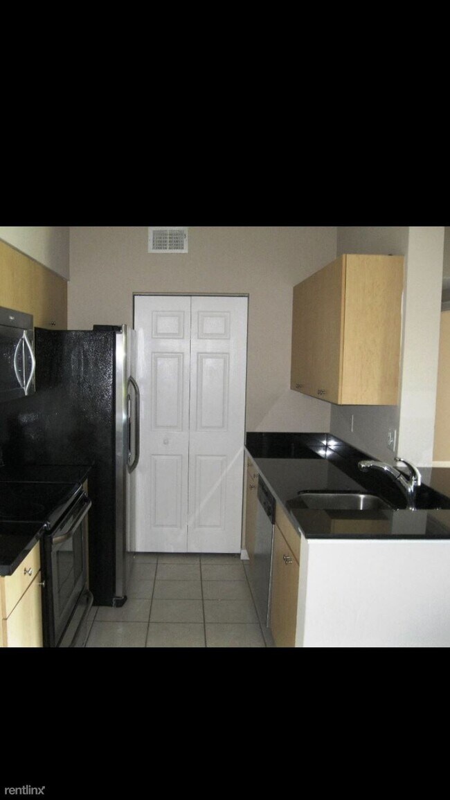 Building Photo - 2 br, 2 bath Condo - Sunset Isles