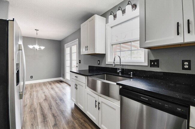 Building Photo - Pet Friendly Three Bedroom with Basement!