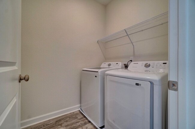 Building Photo - Available 08-05-25! Coastal Luxury Townhom...