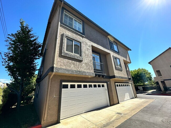 Building Photo - Gated Hayward Townhome with 2-Car Garage & Private Patio