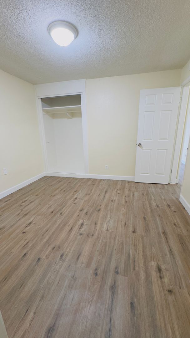 Building Photo - MOVE IN SPECIAL- Downstairs 2 bedroom +1 bath, patio. AVAILABLE NOW!!