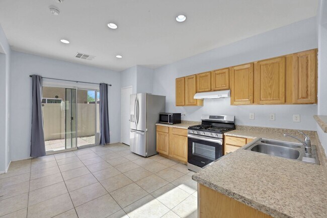 Building Photo - Updated Two-Story 3 bed/2.5 bath Home with Open Kitchen, Attached 1 Car Garage & Modern Flooring ...