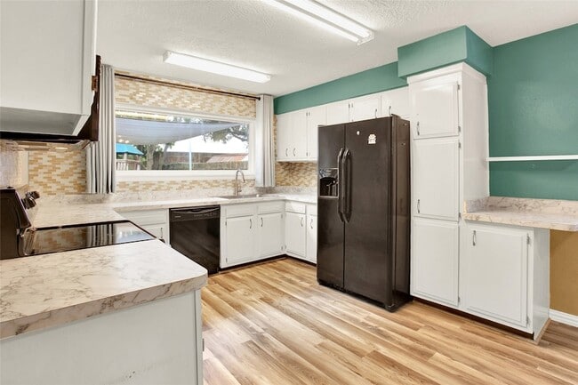 Building Photo - 6219 Silver Leaf Dr