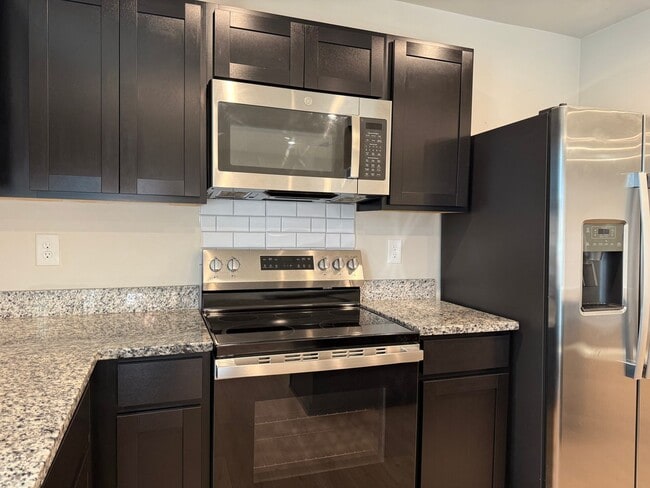 Building Photo - Modern 3-Bedroom Townhouse with Garage & Private Patio