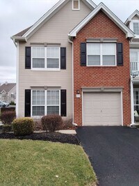 Building Photo - Beautifully upgraded Townhouse style condominium located in Hidden Meadows