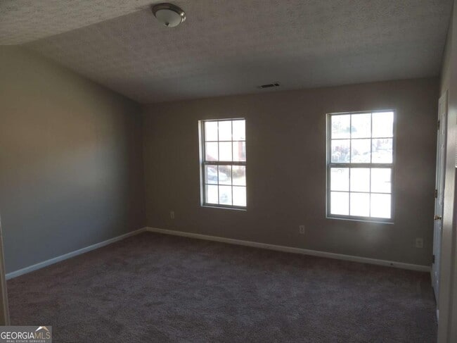 Building Photo - 5659 Windfall Ln