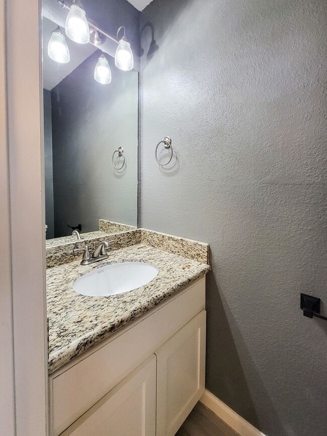Building Photo - Welcome to This Charming Townhome Nestled ...