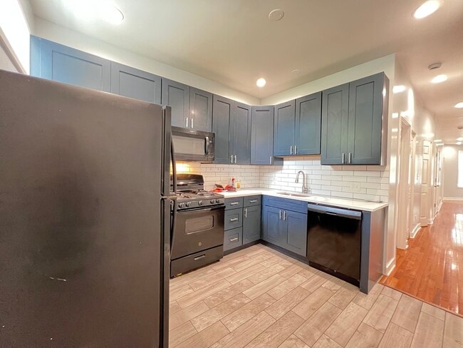 Building Photo - 6402 S Eberhart Ave