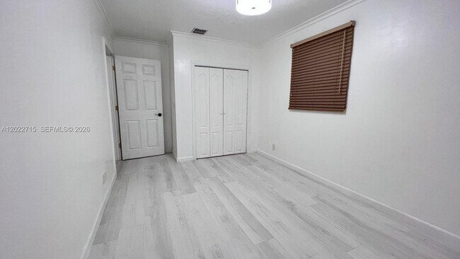 Building Photo - 10669 Boca Entrada Blvd