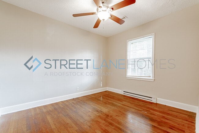 Building Photo - REDUCED! - NOW OFFERING HALF OFF FIRST FUL...