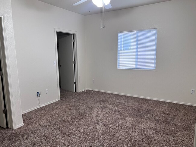 Building Photo - Wonderful 3 Br condo in gated community with the major appliances and 1 car garage.