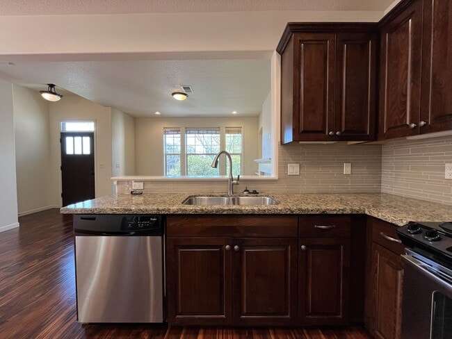 Building Photo - 3BD/3BA Bethany Home with Vaulted Ceilings, Stainless Appliances & Gas Fireplace