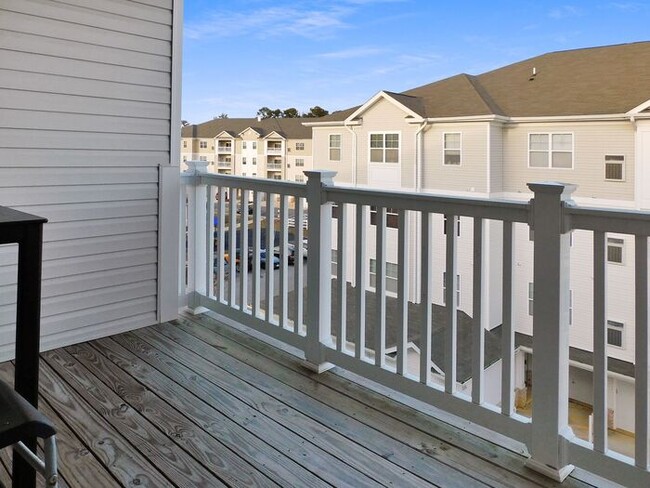 Building Photo - Pet Friendly Condo with Deck and 1 Car Garage