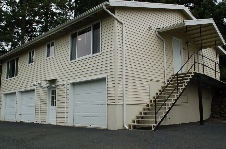 exterior of building and door to laundry below - 617 SW 3rd Pl