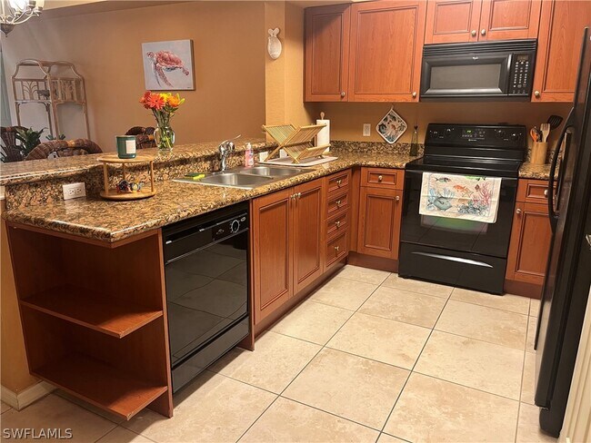 Building Photo - 10110 Villagio Palms Way