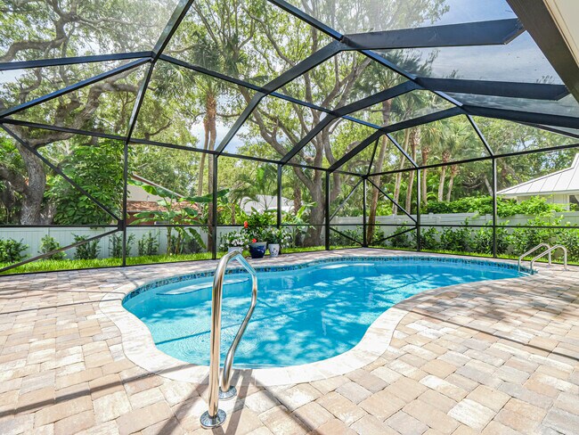Building Photo - 9340 Frangipani Dr