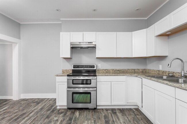 Double oven and Lazy Susan in brand new kitchen. - 1150 Tecumseh St