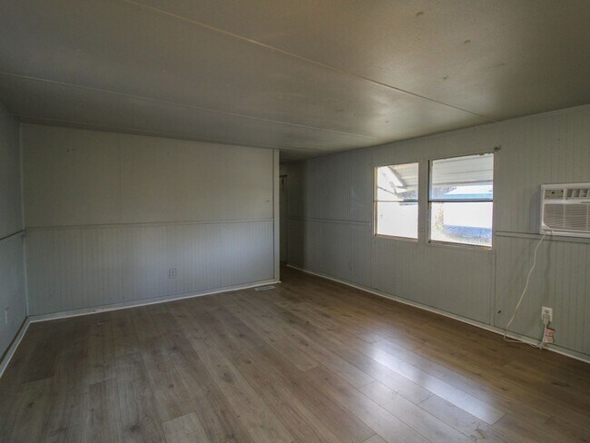 Building Photo - Discover comfortable country living in this nicely updated trailer located just minutes from Faye...