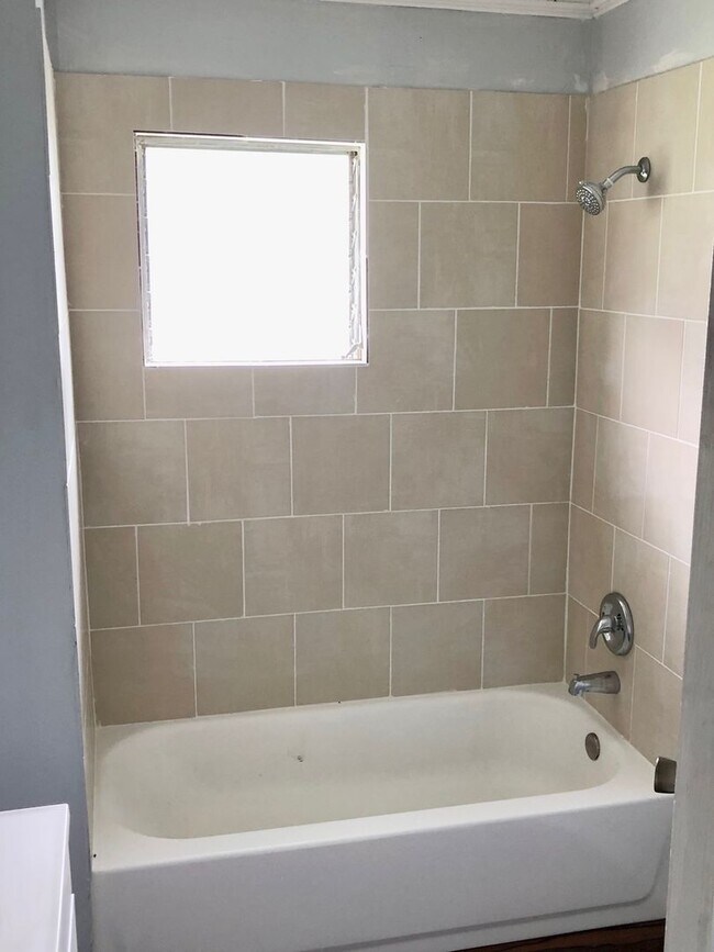 Primary Photo - SPACIOUS Zephyrhills 4BR/1BA Home in the Heart of Downtown!