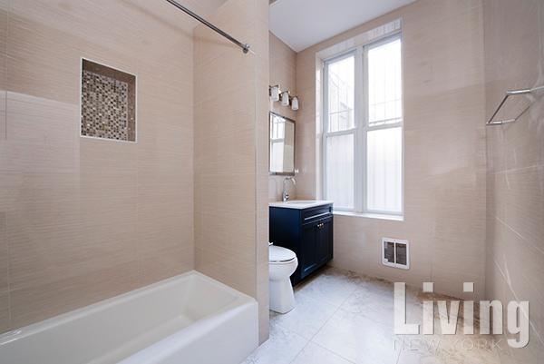 Building Photo - East Village 3 Bdr/2 Bath Duplex with Private Garden & Condo Finishes!
