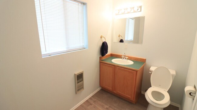 Building Photo - Recently updated 2/1.5 townhome next to th...