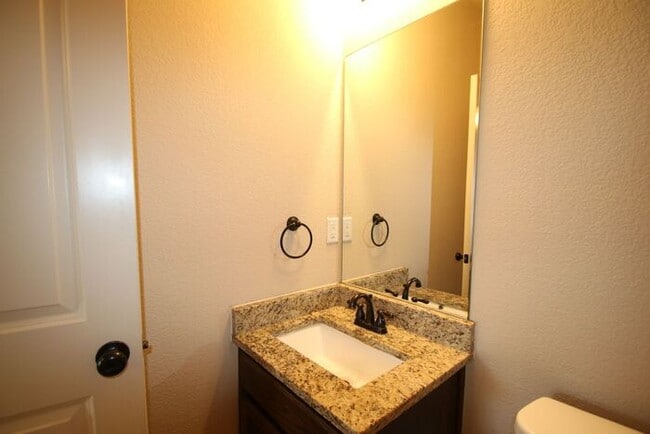 Building Photo - Beautifully Upgraded 3/2 Duplex w/ Garage & Fenced Yard | Off Camp Bowie!