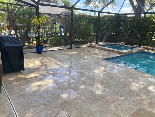 Building Photo - 10440 Cypress Lakes Preserve Dr