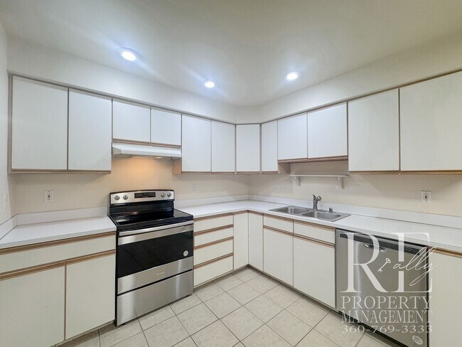 Building Photo - Duplex Living with Expansive Yard, LVP Flooring & Spacious Layout