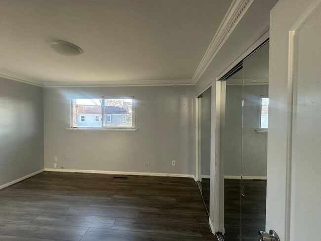 Building Photo - Centrally Located 2 BR Green Townhome with Fenced Patio