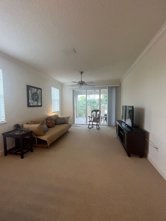 Building Photo - FURNISHED 2/2 condo in The Tidelands!