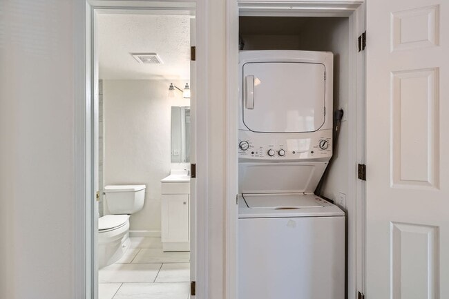 Building Photo - MOVE-IN SPECIAL ($250): Spacious Condo wit...