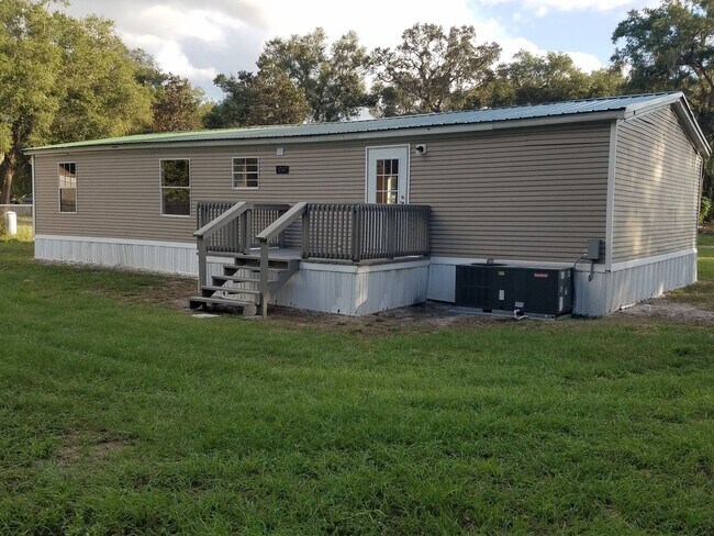 Building Photo - 3 bed, 2 bath w/ Front & Back Decks, 1/4 Acre of land, FENCED backyard