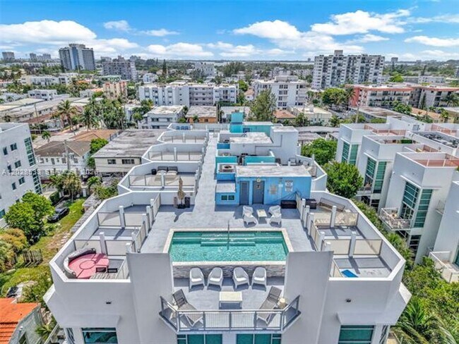 Building Photo - 7728 Collins Ave
