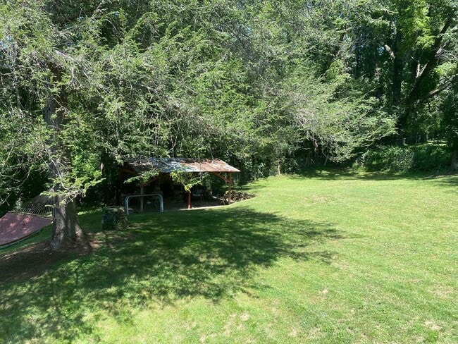 Building Photo - North AVL - Spacious Home with Large Yard and Outdoor Fireplace!