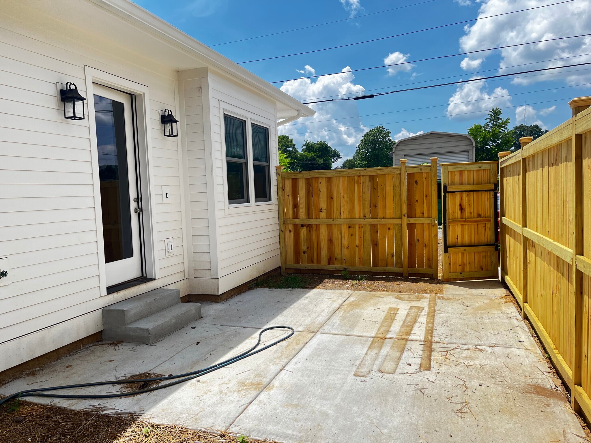 Patio completely fenced in. - 2101 Grantland Ave