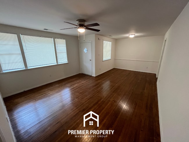 Building Photo - Spacious 3BR/2BA Home with Den & Living Room | Brick Fireplace & Large Yard