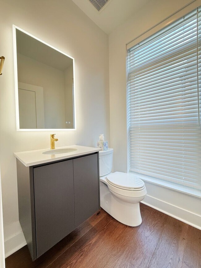 Building Photo - Brand new 4 level, 4 Bedroom Townhome with Elevator!