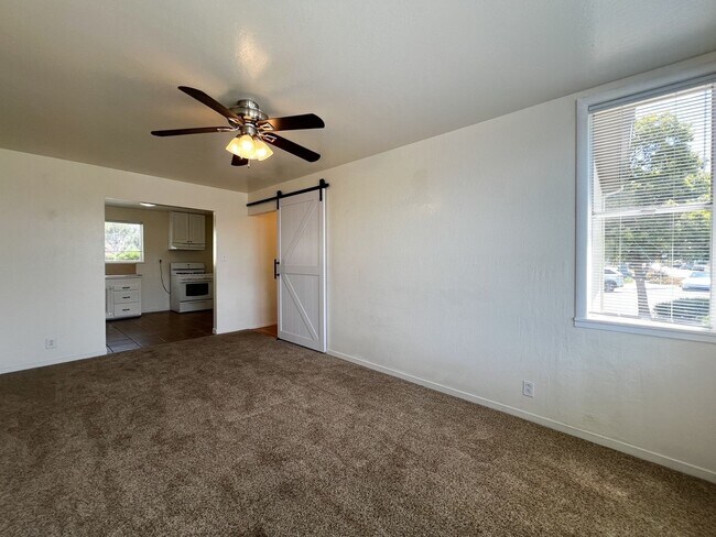 Building Photo - Charming 2 Bedroom, 1 Bathroom Home with Large Fenced Yard + Garage