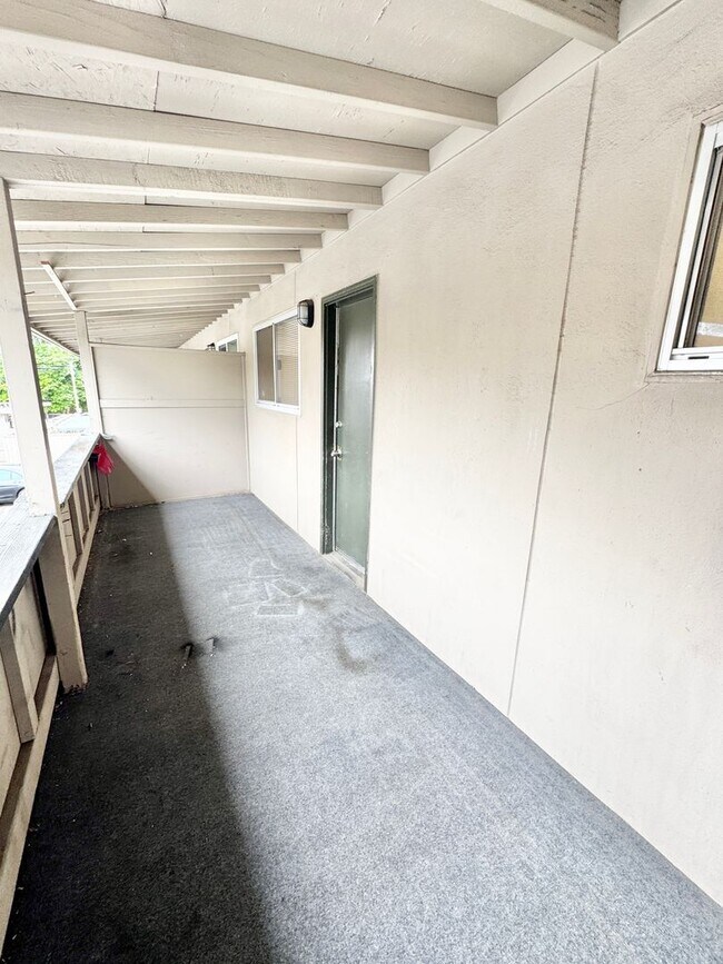 Building Photo - Move-In Special; Upstairs One Bedroom + Private Patio – SEE VIDEO